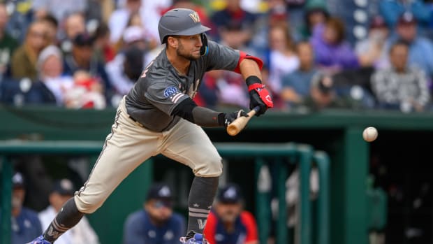 Sep 24, 2023; Washington, District of Columbia, USA; Washington Nationals third baseman Carter Kieboom (8) hits a bunt single during the sixth inning against the Atlanta Braves at Nationals Park.
